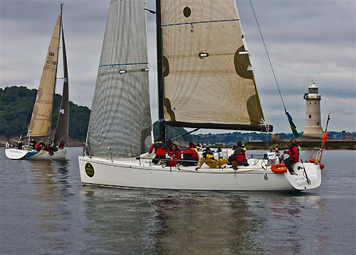 Alain Catherineau's J/122 Lorelei (FRA) crossing the finish line off Plymouth, during the Rolex Fastnet Race 2011. Photo copyright Rolex and Carlo Borlenghi.