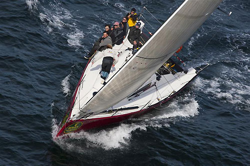 Bernard Moureau's JND 35 Gaia (FRA) at the Fastnet Rock, during the Rolex Fastnet Race 2011. Photo copyright Rolex and Carlo Borlenghi.