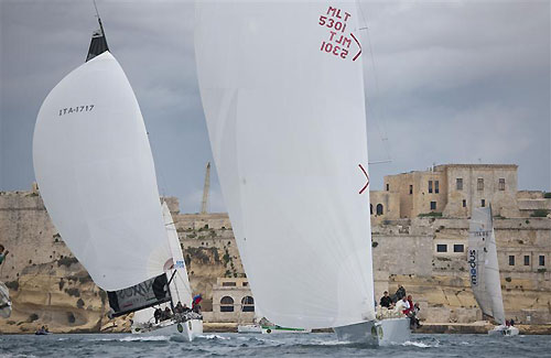 Pit Finis� Ker 53 Dralion (MLT) and Vincenzo Addessi's Mylius Fra Diavolo Naxos, during the Rolex Middle Sea Race 2011. Photo copyright Kurt Arrigo, Rolex.
