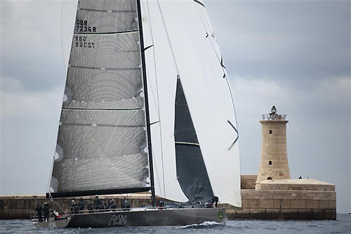 Niklas Zennstr�m�s JV72, R�n (GBR) sails out of Grand Harbour, during the Rolex Middle Sea Race 2011. Photo copyright Kurt Arrigo, Rolex.
