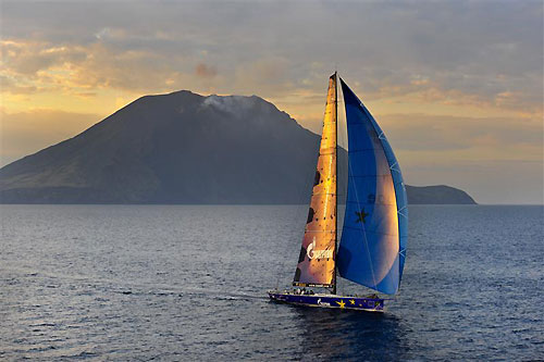 Igor Simcic�s Reichel Pugh 100 Esimit Europa 2 (SLO) rounding Stromboli, during the Rolex Middle Sea Race 2011. Photo copyright Kurt Arrigo, Rolex.