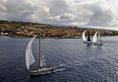 Benucci Roberto's One (ITA) ahead Karuba V (CRO) skippered by Goranko Fizulic, and Florio Massimiliano's Grande Orazio (ITA), passing through the Strait of Messina, during the Rolex Middle Sea Race 2011. Photo copyright Kurt Arrigo, Rolex.