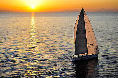 The Reichel Pugh 60 Wild Joe (HUN), at sunset on the second day, during the Rolex Middle Sea Race 2011. Photo copyright Kurt Arrigo, Rolex.