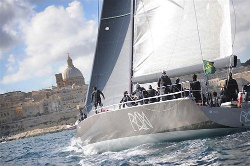 Niklas Zennstr�m�s R�n, crossing the finish line at 11:10 CEST, during the Rolex Middle Sea Race 2011. Photo copyright Rene Rossignaud, Rolex.