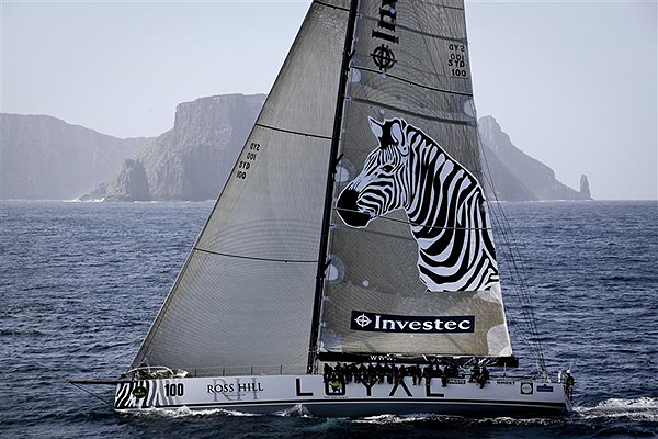 Anthony Bell�s Investec Loyal enters Storm Bay off Tasman Island. Photo copyright Daniel Forster, Rolex.