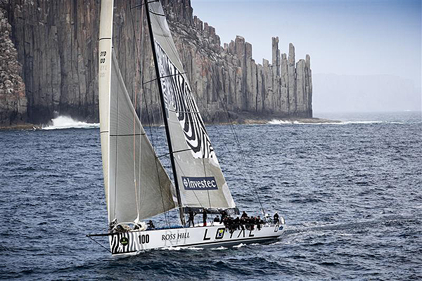 Anthony Bell�s Investec Loyal passing Tasmania's iconic Organ Pipes at Cape Raoul. Photo copyright Daniel Forster, Rolex.