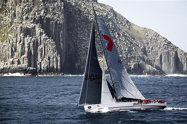 Bob Oatley's Wild Oats XI passing Tasman Island to enter Storm Bay. Photo copyright Daniel Forster, Rolex.