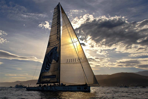 Anthony Bell�s Investec Loyal on the Derwent River approaching the Hobart finish line. Photo copyright Kurt Arrigo, Rolex.