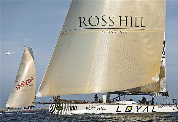 Anthony Bell�s Investec Loyal and Bob Oatley's Wild Oats XI, skippered by Mark Richards, on the Derwent River approaching the Hobart finish line. Photo copyright Kurt Arrigo, Rolex.