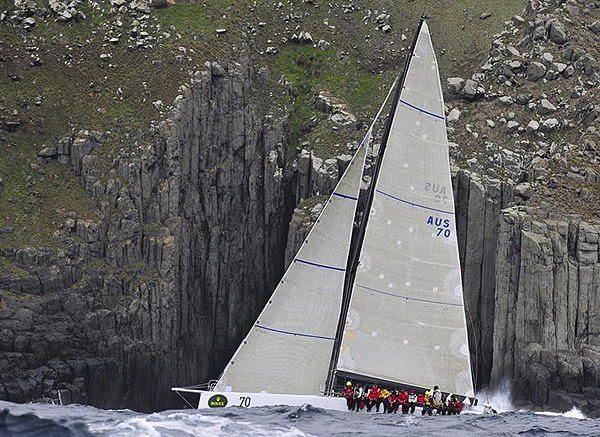 Syd Fischer's modified TP52 Ragamuffin off Tasman Island, during the 2011 Rolex Sydney Hobart Yacht Race. Photo copyright Kurt Arrigo, Rolex.