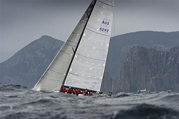 Chris Bull's British Cookson 50 Jazz passing Tasmania's Cape Raoul, during the 2011 Rolex Sydney Hobart Yacht Race. Photo copyright Kurt Arrigo, Rolex.