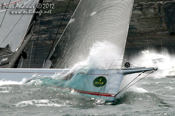 Bob Oatley's Wild Oats XI at the heads of Sydney Harbour after the start of the 2012 Sydney Hobart Yacht Race. Photo copyright Peter Andrews, Outimage Australia.