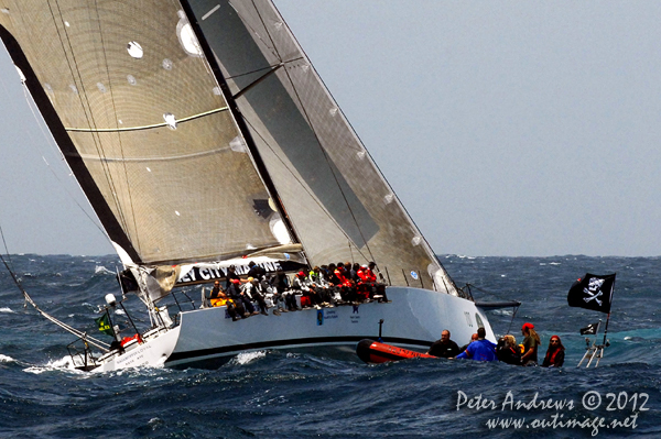 Local pirates checking out Syd Fischer's Ragamuffin Loyal outside the heads of Sydney Harbour after the start of the 2012 Sydney Hobart Yacht Race. Photo copyright Peter Andrews, Outimage Australia.