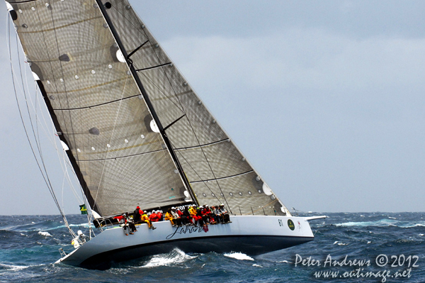 Peter Millard and John Honan's Bakewell-White 30m Maxi Lahana, outside the heads of Sydney Harbour after the start of the 2012 Sydney Hobart Yacht Race. Photo copyright Peter Andrews, Outimage Australia.