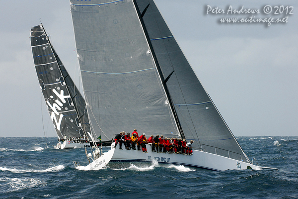 Stephen Ainsworth's Reichel Pugh 63 Loki and Matt Allen's Jones 70 custom Ichi Ban, outside the heads of Sydney Harbour after the start of the 2012 Sydney Hobart Yacht Race. Photo copyright Peter Andrews, Outimage Australia.