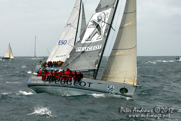 Sebastien Guyot's Beneteau 45 Peugeot-Surfrider and John and Ian Paterson's Corel 45 Rush, outside the heads of Sydney Harbour after the start of the 2012 Sydney Hobart Yacht Race. Photo copyright Peter Andrews, Outimage Australia.