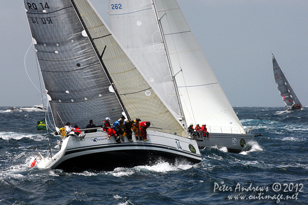 Robbo Robertson's Beneteau First 40 Lunchtime Legend and Rob Fisher's Adams 20 Helsal III, outside the heads of Sydney Harbour after the start of the 2012 Sydney Hobart Yacht Race. Photo copyright Peter Andrews, Outimage Australia.