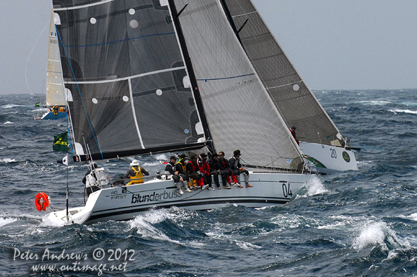 Tony Kinsman's Beneteau First 40 Blunderbuss and Ken Simpson's DK46 Dekadence, outside the heads of Sydney Harbour after the start of the 2012 Sydney Hobart Yacht Race. Photo copyright Peter Andrews, Outimage Australia.