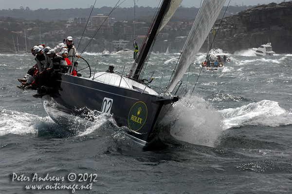 Bob Steel's TP52 Quest, outside the heads of Sydney Harbour after the start of the 2012 Sydney Hobart Yacht Race. Photo copyright Peter Andrews, Outimage Australia.