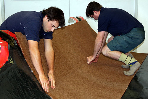 Honeycomb core being laid over two skins of carbon fibre. Photo copyright Van Munster Boats for the Australian 18 Footers League.