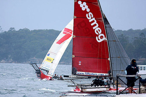 The difference between Smeg and Gotta Love It 7 at the finish, during Race 12 of the Club Championship Race. Photo copyright Australian 18 Footers League.