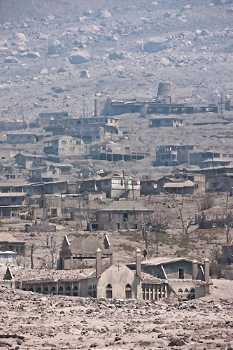 Remains of a town in the shadow of Montessart's active volcano, RORC Caribbean 600. Photo copyright Carlo Borlenghi.