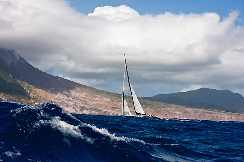 Mike Slade's 100ft Maxi ICAP Leopard passing Montessart's active volcano, RORC Caribbean 600. Photo copyright Carlo Borlenghi.