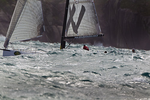 Torben Grael's S40 Mitsubishi - GOL (Magia V) (BRA) racing in the Alcatrazes por Boreste race, during the Rolex Ilhabela Sailing Week 2010. Photo copyright Rolex and Carlo Borlenghi.