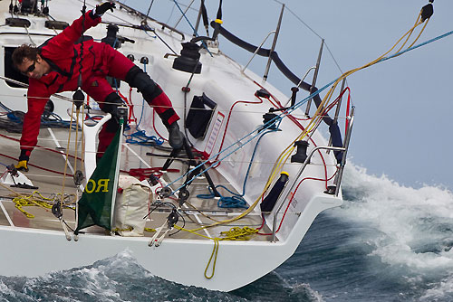 A balancing act onboard Torben Grael's S40 Mitsubishi - GOL (Magia V) (BRA) racing in the Alcatrazes por Boreste race, during the Rolex Ilhabela Sailing Week 2010. Photo copyright Rolex and Carlo Borlenghi.