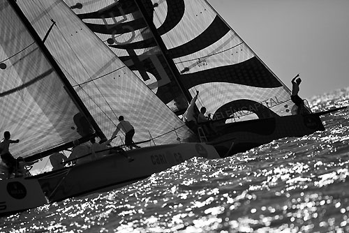 Jorge Errazuriz Grez's Celfin Capital (CHI) at the top, Roberto Martinez's Carioca (BRA) centre and Jose Estevez's Cusi 5 at the start of an S40 fleet race, during the Rolex Ilhabela Sailing Week 2010. Photo copyright Rolex and Carlo Borlenghi.