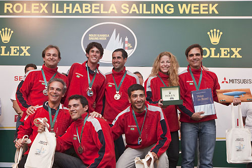 Renato Cunha's Beneteau 40.7 Ventaneiro (BRA), winner in the in the ORC International 600 class is presented with a watch from Stephan Meili, Rolex Brasil, during the Rolex Ilhabela Sailing Week 2010. Photo copyright Rolex and Carlo Borlenghi.