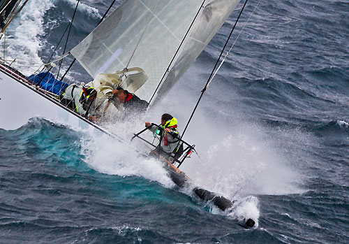 The bowman at work on Sean Langman and Anthony Bell's Elliott Maxi Investec Loyal, out in the Tasman Sea during Rolex Sydney Hobart Yacht Race 2010, Australia. Photo copyright Carlo Borlenghi, Rolex.
