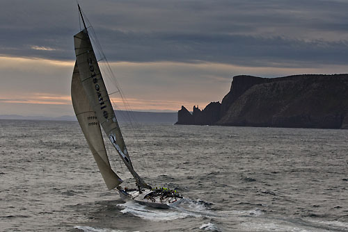 Sean Langman's 100-foot Elliott Investec Loyal, approaching Tasman Island during the Rolex Sydney Hobart 2010. Photo copyright Carlo Borlenghi, Rolex.