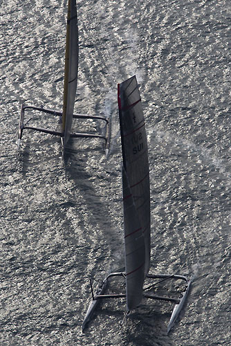 Valencia, Spain, February 14, 2010. Alinghi ahead of USA 17 on day 7, early in Race 2 of the 33rd America's Cup. Photo copyright Carlo Borlenghi, Alinghi.