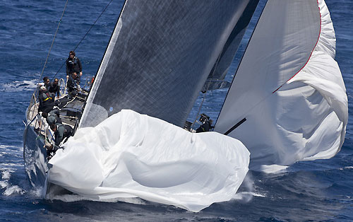 A spinnaker drop on Y3K, offshore during the Loro Piana SuperYacht Regatta 2011, Porto Cervo, Italy. Photo copyright Carlo Borlenghi.