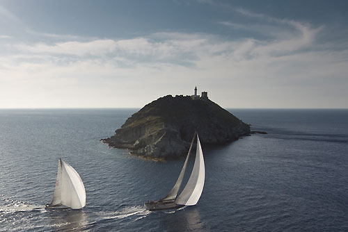 Brian Benjamin's Carbon Ocean 82, Aegir and Noel Franck's Near Miss rounding Giraglia Rock, during the Giraglia Rolex Cup 2011, Saint-Tropez, France, June 18-25. Photo copyright Rolex and Carlo Borlenghi.