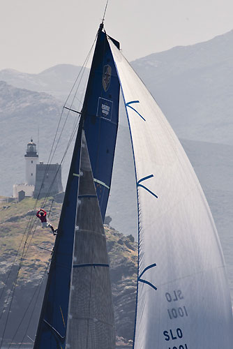 Igor Simcic's Esimit Europa 2 passes Giraglia Rock, during the Giraglia Rolex Cup 2011, Saint-Tropez, France, June 18-25. Photo copyright Rolex and Carlo Borlenghi.