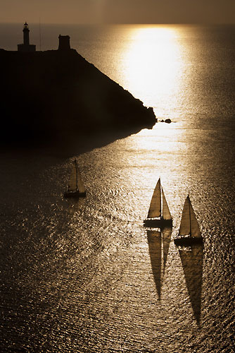 The Fleet at Giraglia Rock at sunset, during the Giraglia Rolex Cup 2011, Saint-Tropez, France, June 18-25. Photo copyright Rolex and Carlo Borlenghi.