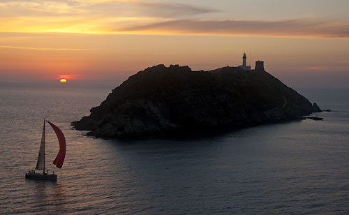 Paolo Podesta's Grand Soleil 50 One at Giraglia Rock at sunset, during the Giraglia Rolex Cup 2011, Saint-Tropez, France, June 18-25. Photo copyright Rolex and Carlo Borlenghi.