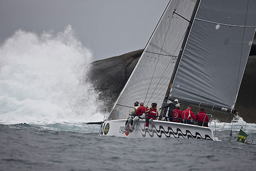 Roberto Luiz M.P E Souza's Soto 40 Carioca (BRA4), during the Rolex Ilhabela Sailing Week 2011. Carioca (BRA4) manobra diante do costão da ilha Alcatrazes. Photo copyright Rolex and Carlo Borlenghi.