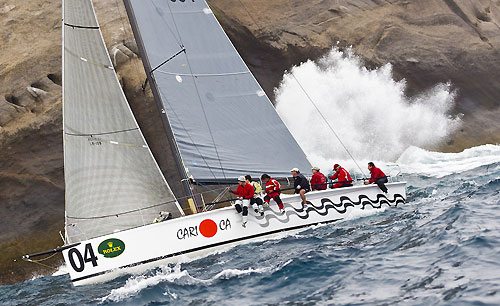 Roberto Luiz M.P E Souza's Soto 40 Carioca (BRA), during the Rolex Ilhabela Sailing Week 2011. Carioca (BRA), manobra diante do costão da ilha Alcatrazes. Photo copyright Rolex and Carlo Borlenghi.