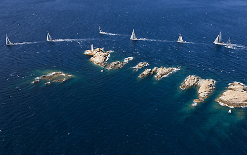 Maxi fleet rounding Monaci Island, during the Maxi Yacht Rolex Cup 2011, Porto Cervo, Italy. Photo copyright Carlo Borlenghi for Rolex.