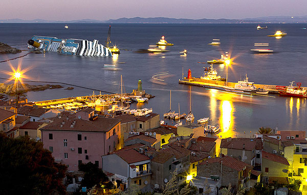 The Costa Concordia, Giglio Island, January 25, 2012. Photo copyright Carlo Borlenghi.