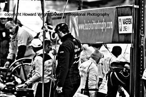 A Emirates Team New Zealand crew member deep in thought on the final day prior to racing. Photo copyright Howard Wright 2010.