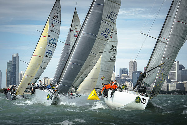 Nico Poons' Charisma (MON 69) with tactician Stuart Bannatyne from Monaco ahead of Alberto Rossi's Efant Terrible (ITA 29141) with tactician Torben Grael from Ancona, Italy, offshore Chicago. Photo copyright Kurt Arrigo for Rolex.