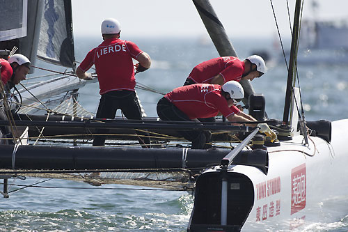 Charlie Ogletree's China Team at the America's Cup World Series, Cascais, Portugal, August 6-14, 2011. Photo copyright Morris Adant.