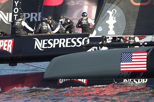 Dean Barker's Emirates Team New Zealand shadowed by one of the Oracle boats at the America's Cup World Series, Cascais, Portugal, August 6-14, 2011. Photo copyright Morris Adant.