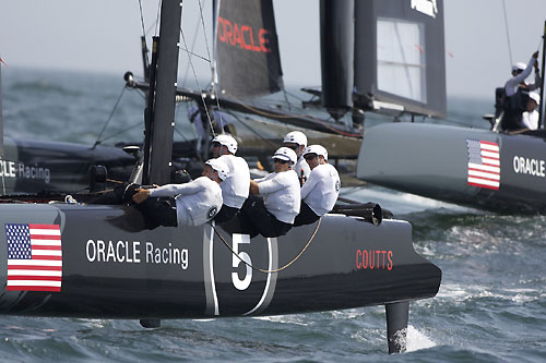 Russell Coutts' and James Spithill's ORACLE Racing AC45 wing-sailed catamarans at the America's Cup World Series, Cascais, Portugal, August 6-14, 2011. Photo copyright Morris Adant.