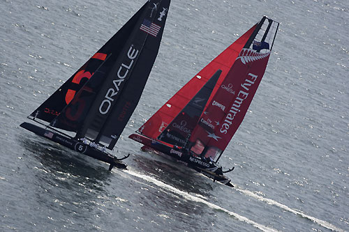 Russell Coutts' ORACLE Racing ahead of Dean Barker's Emirates Team New Zealand at the America's Cup World Series, Cascais, Portugal, August 6-14, 2011. Photo copyright Morris Adant.