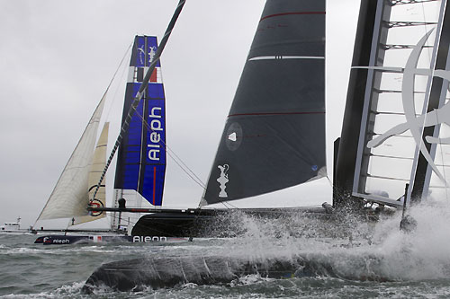 Terry Hutchinson's Artemis Racing with Bertrand Pac's Aleph in the background at the America's Cup World Series, Plymouth, UK, September 10-18, 2011. Photo copyright Morris Adant.